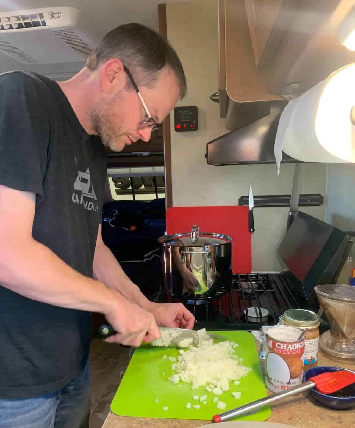 https://campaddict.com/wp-content/uploads/Marshall-cutting-onions-in-RV-kitchen.jpg